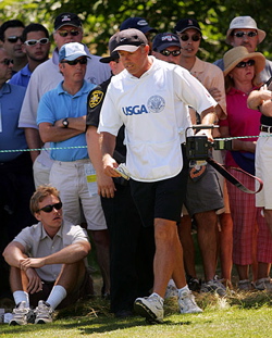 Steve Williams takes a camera