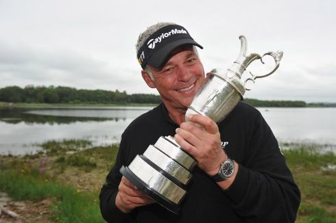 2011 British Open winner Darren Clarke holding the trophy